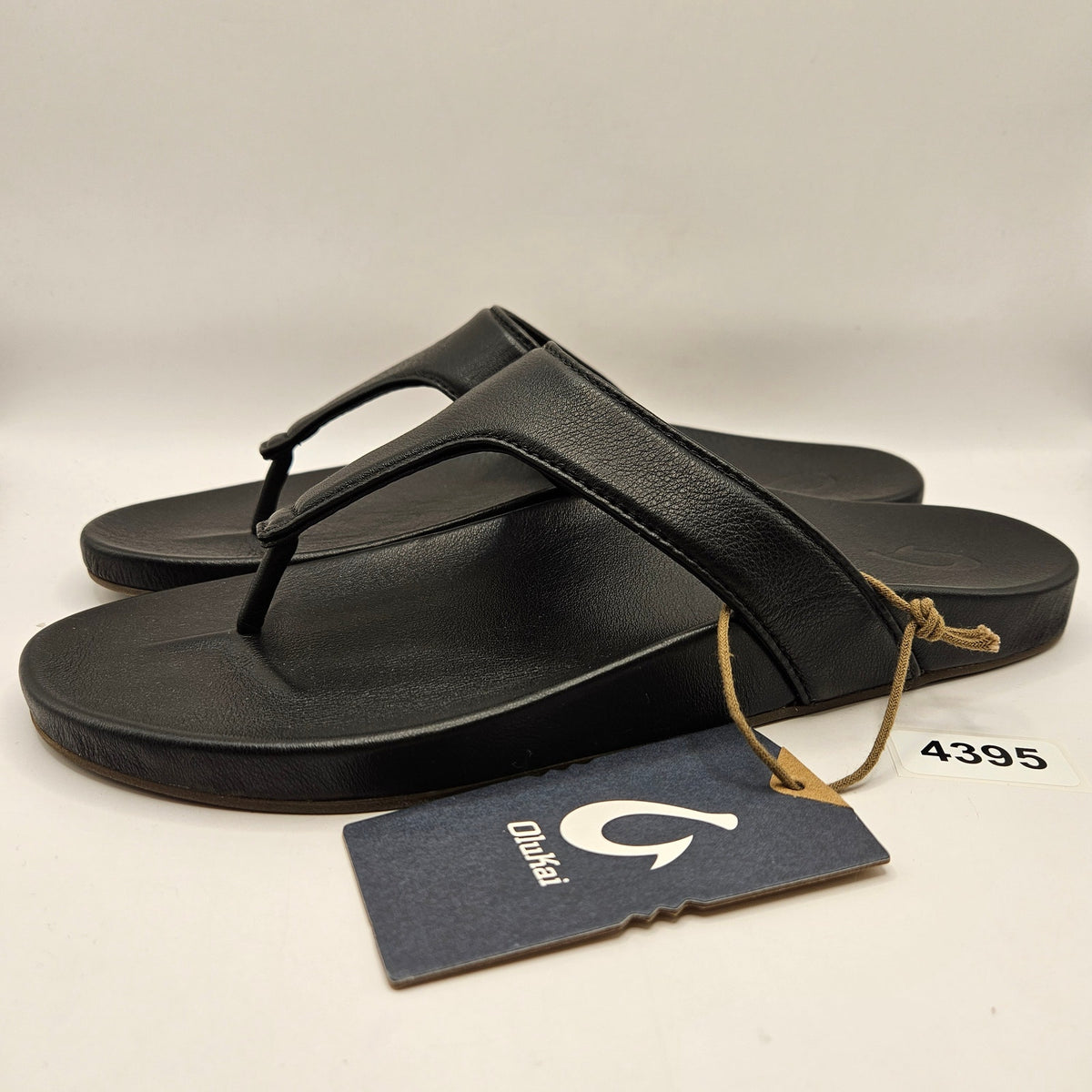 OLUKAI WOMEN'S 11 KIPE'A LIPI BLACK/BLACK SANDAL 20502-4040