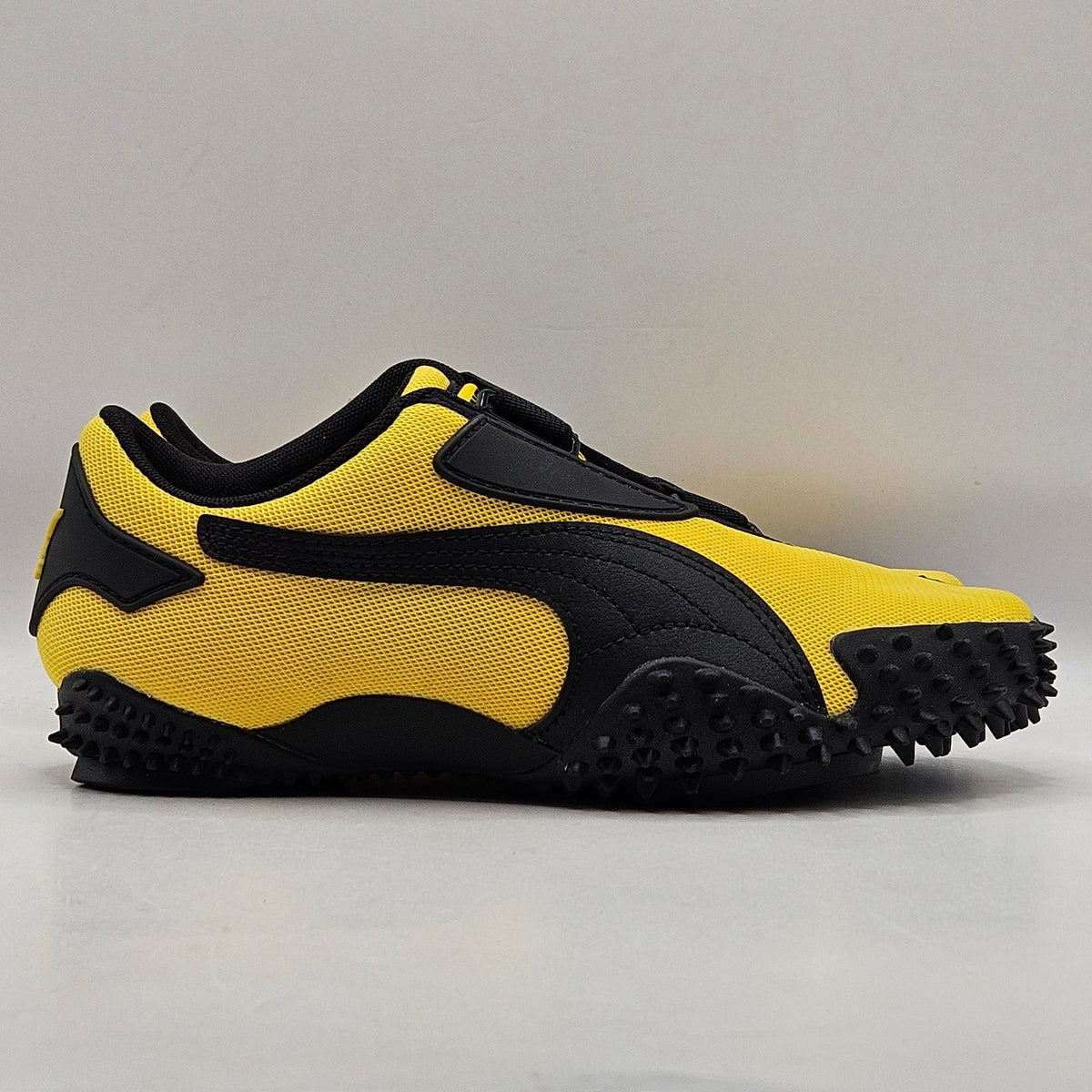 PUMA WOMEN'S 6.5 KIDS 5 MOSTRO OG PRIME PELE YELLOW BLACK STRAP ON 403729-06