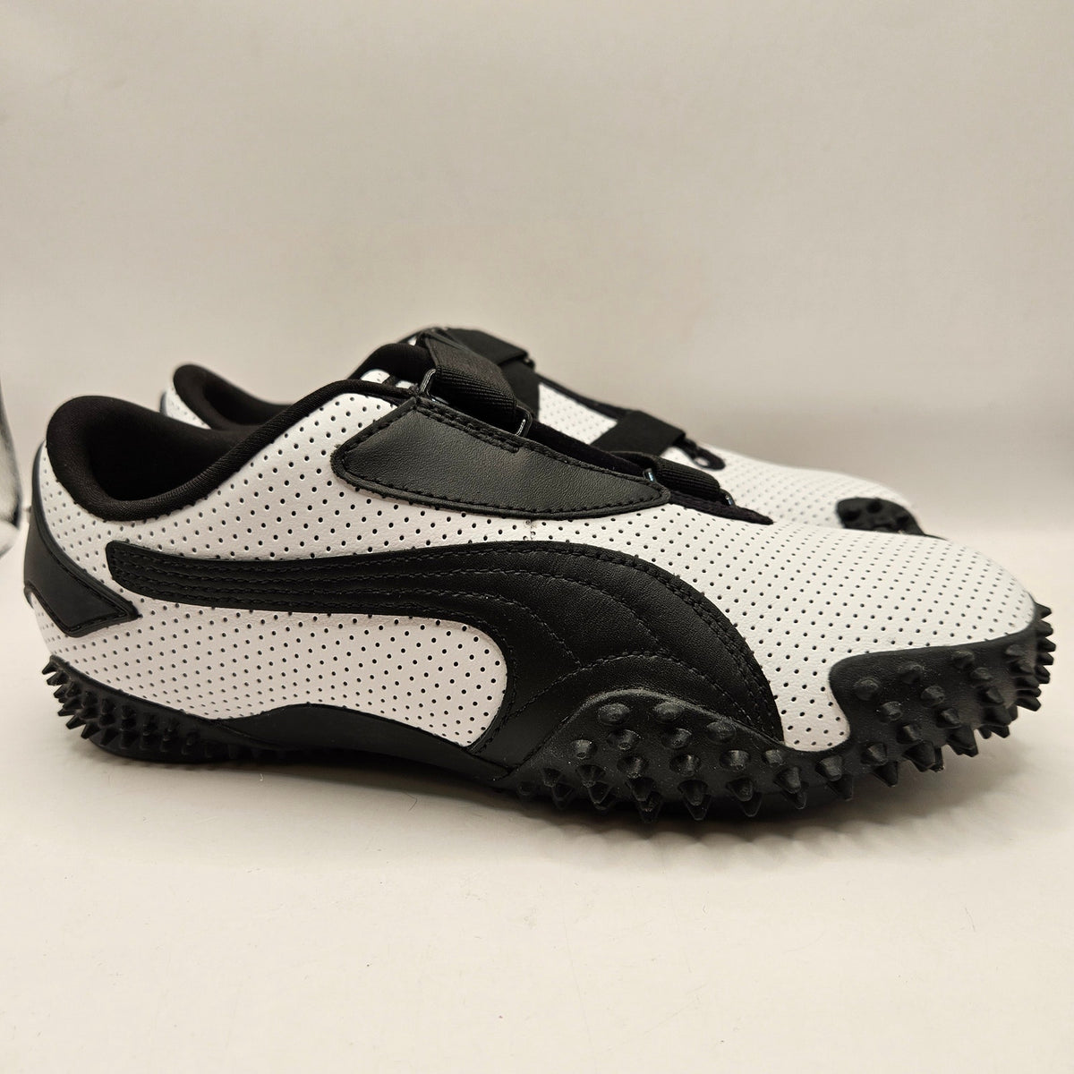 PUMA WOMEN'S 8.5 MOSTRO WHITE BLACK PERFORATED LEATHER LOW TOP SNEAKER