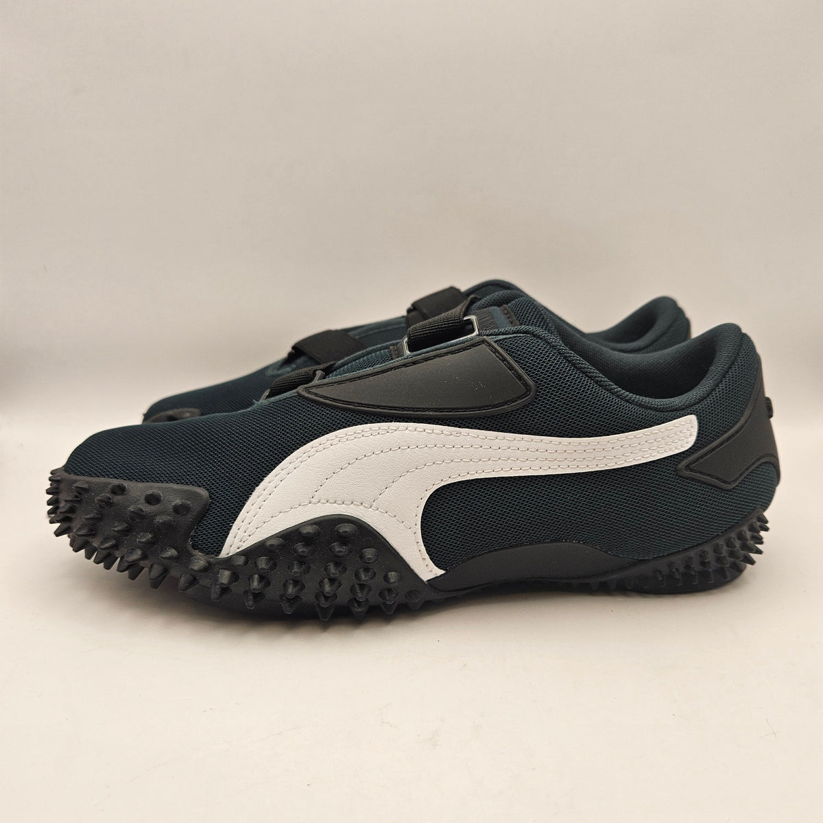 PUMA WOMEN'S 7 MOSTRO PERF BLACK WHITE SPIKE SLIP ON SNEAKERS NWOB