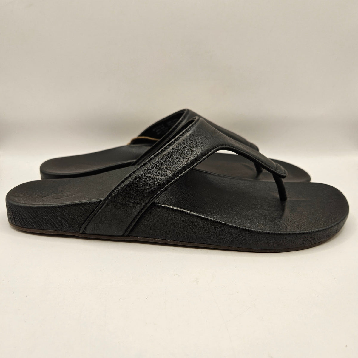 OLUKAI WOMEN'S 11 KIPE'A LIPI BLACK/BLACK SANDAL 20502-4040