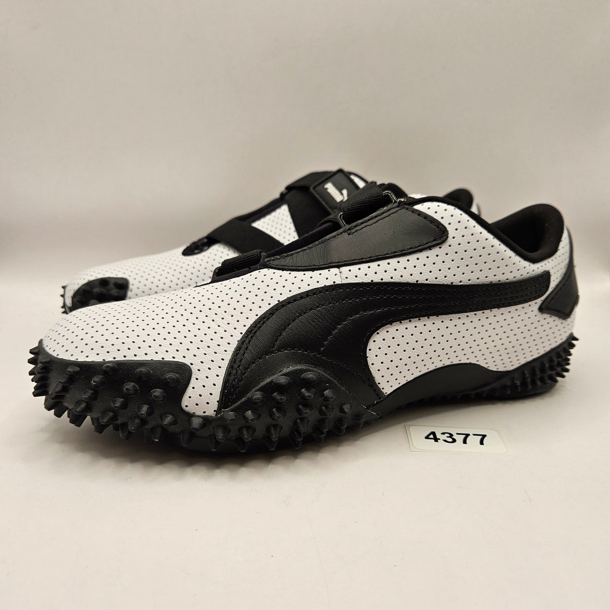 PUMA WOMEN'S 8.5 MOSTRO WHITE BLACK PERFORATED LEATHER LOW TOP SNEAKER