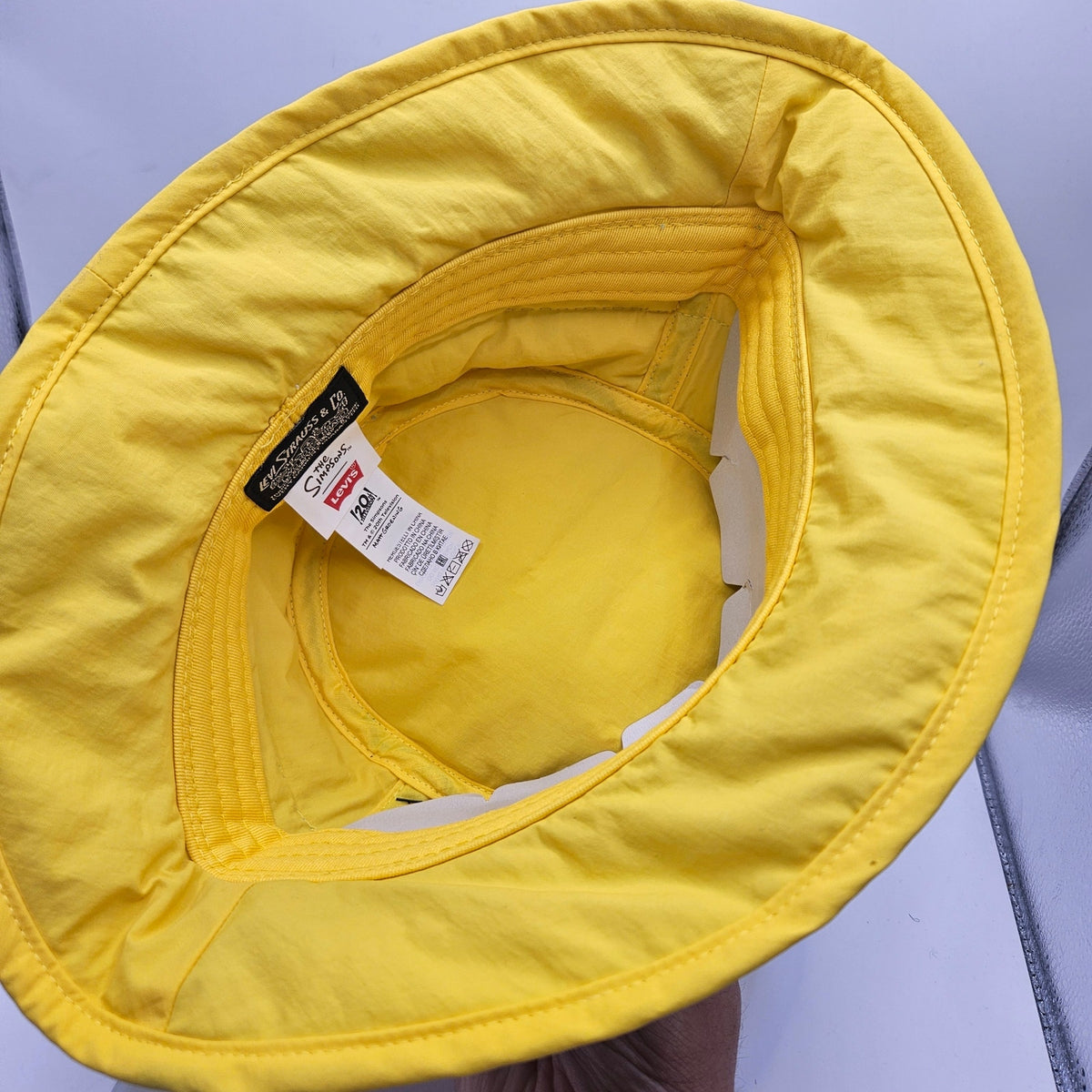 LEVI'S X SIMPSONS UNISEX MEDIUM CLOUD PRINT PUFFY BUCKET HAT BLUE YELLOW NWT