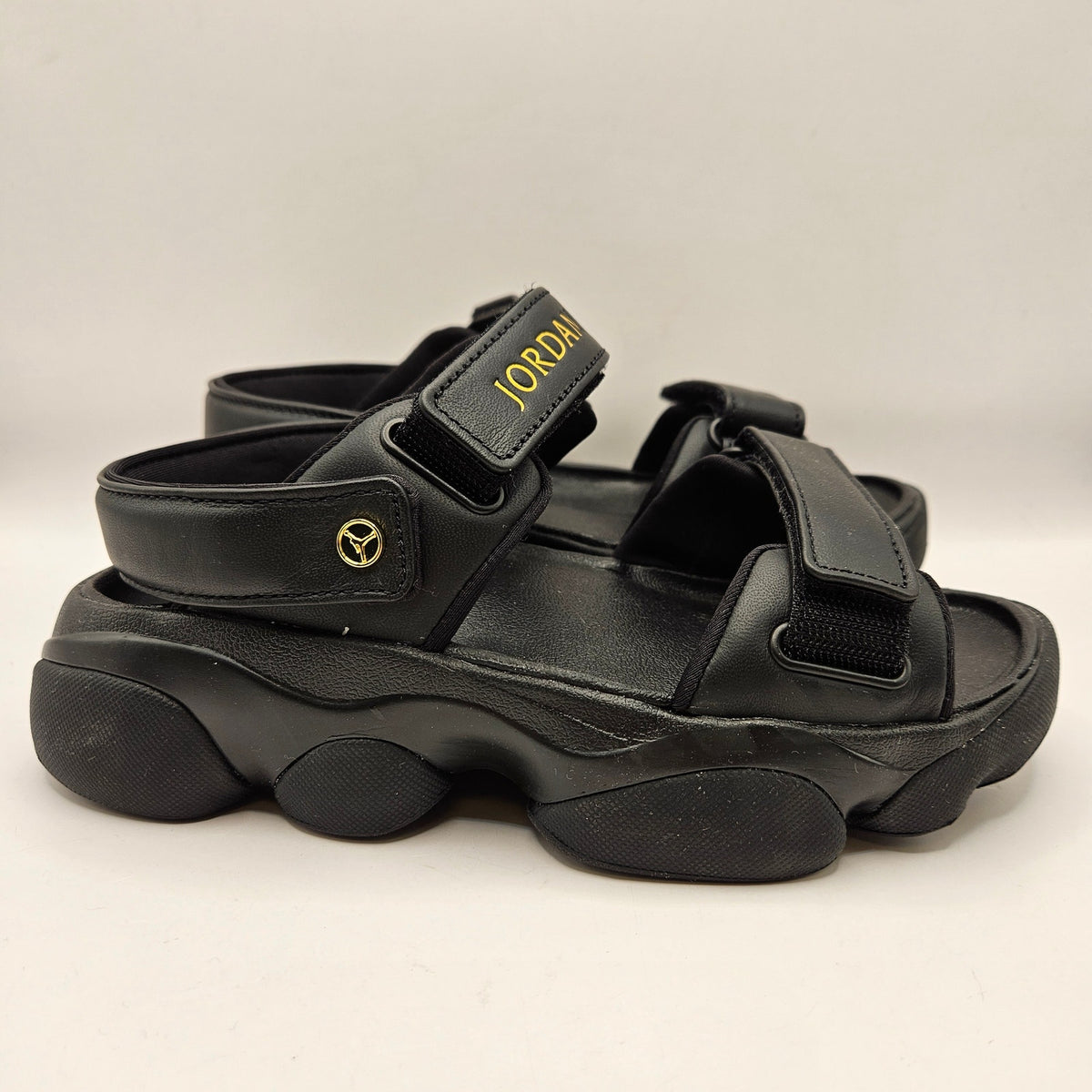 JORDAN WOMEN'S 7 DEJA SANDALS FN5036-001 BLACK METALLIC GOLD
