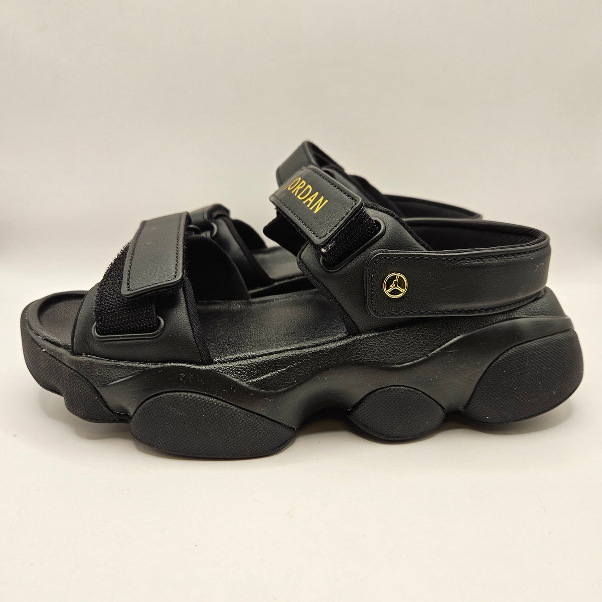 JORDAN WOMEN'S 7 DEJA SANDALS FN5036-001 BLACK METALLIC GOLD