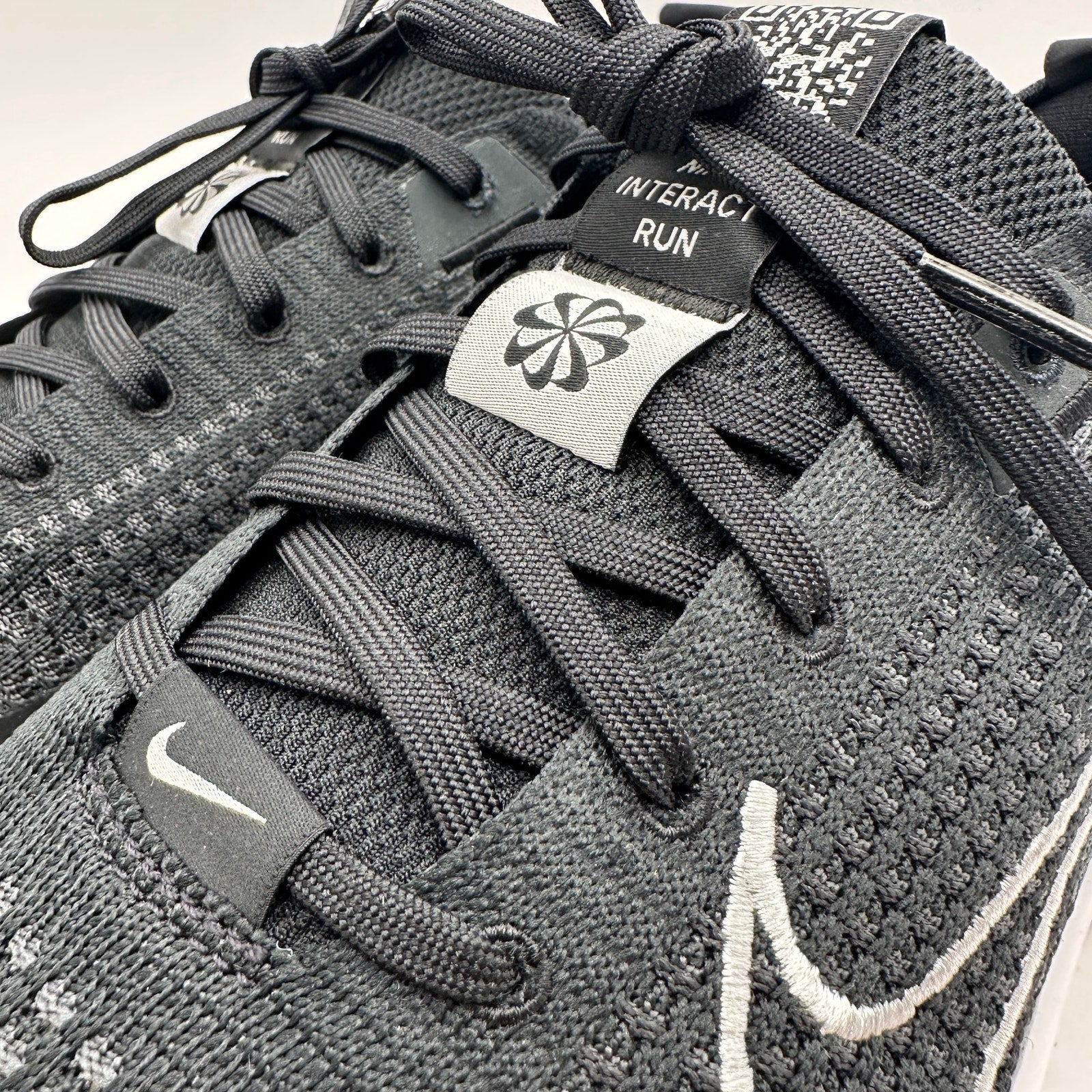 NIKE Women's 12 Interact Run Black/White Running Sneaker fd2292-003