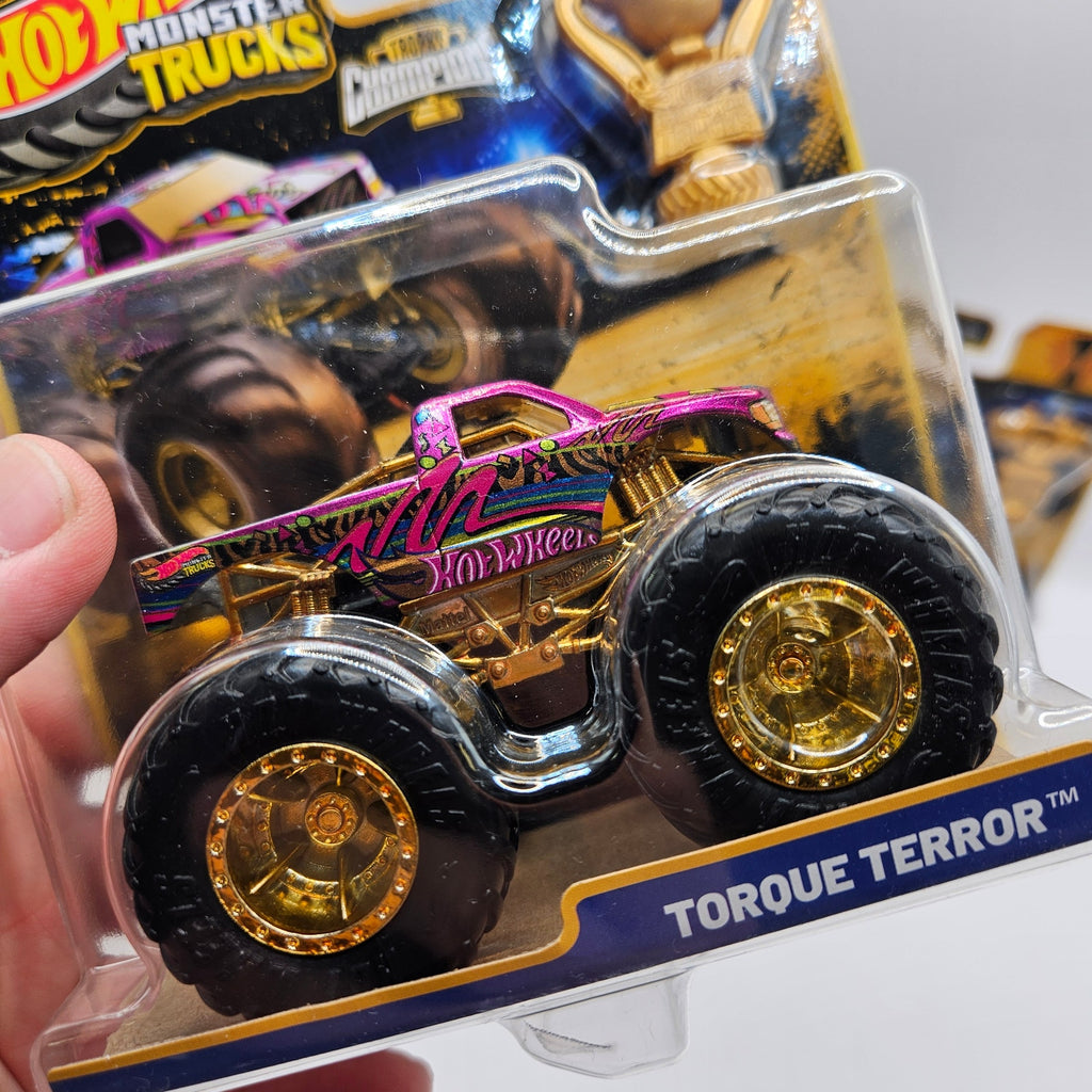 HOT WHEELS MONSTER TRUCKS TROPHY CHAMPIONS GOLD SERIES LOT OF 4 BIG FOOT SNEAKER